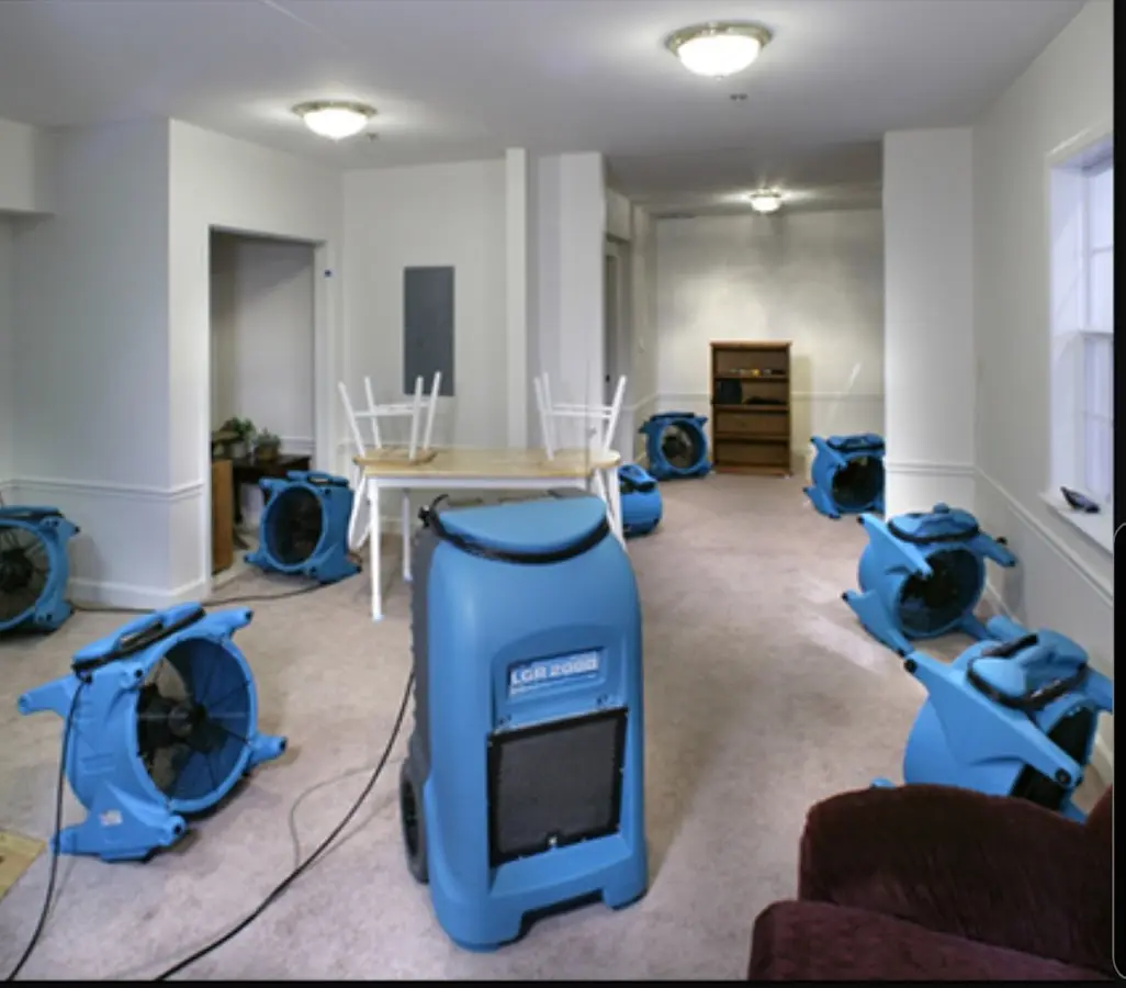 Air movers and dehumidifier setup for Water Damage Restoration in New York